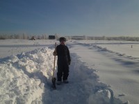 Расчистка дороги от снега зимой 2013 года